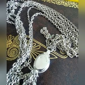 Vintage Lovely white tone necklace with multi lucky 7 strand layer.